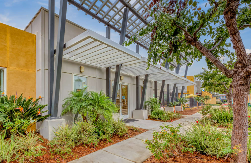 Paved walkway outside at Tesoro Grove Apartments in San Diego, California
