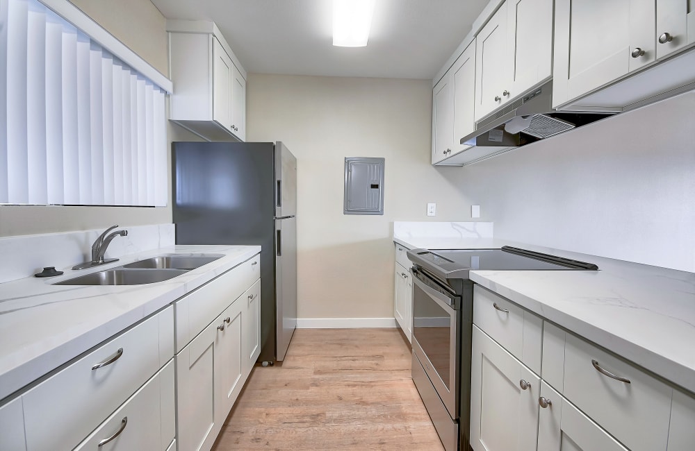 Modern apartment kitchen at Bay Breeze in Costa Mesa, California