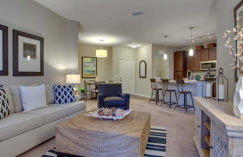 Living space with wall art Whitepalm Luxury Apartment Homes in Port Orange, Florida