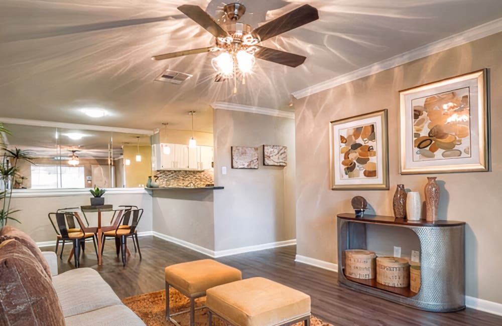 Spacious living room with wood plank flooring at Rayfords Edge Apartments in Spring, Texas Friday, November 15