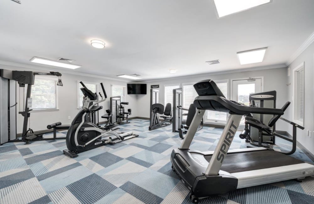 Well-equipped fitness center with cardio equipment at Hidden Lakes Apartment Homes in Miamisburg, Ohio