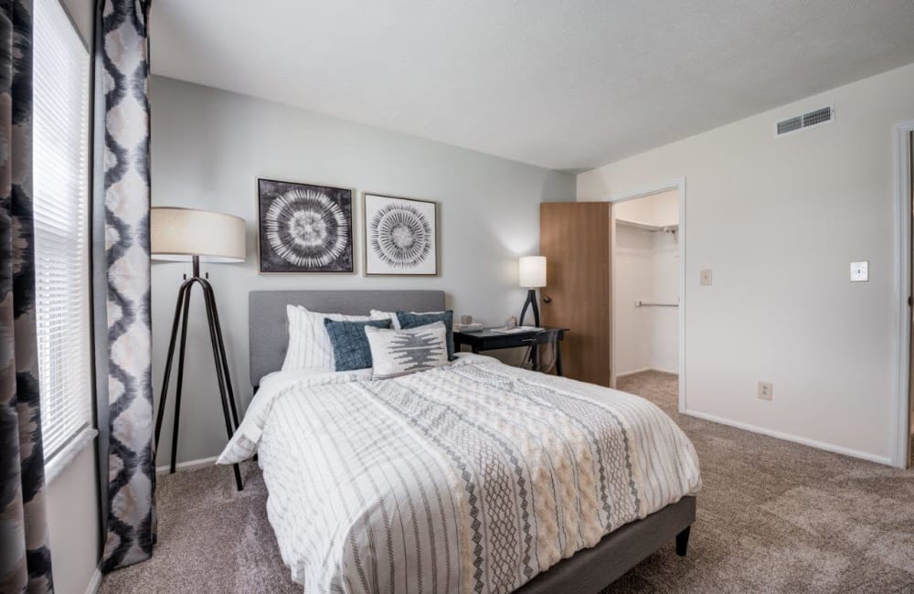 Luxury and spacious bedroom with access to natural lighting at Hidden Lakes Apartment Homes in Miamisburg, Ohio