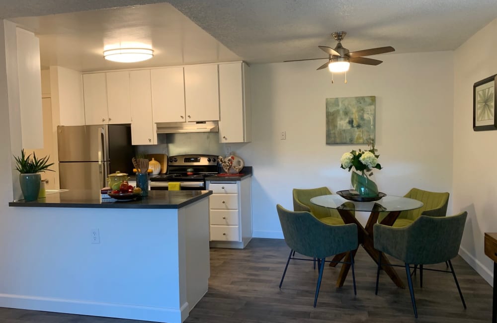 Kitchen and dining room in a model home at Point Alameda in Alameda, California