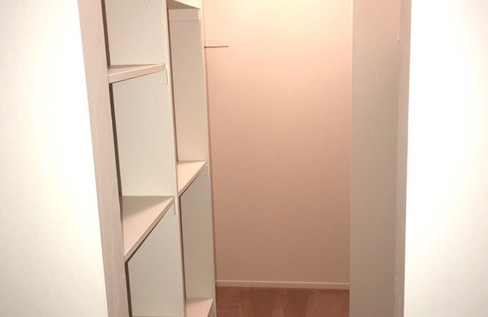 Useful shelving units in the closet of a bedroom in a model home at Parkway Green in Union City, California
