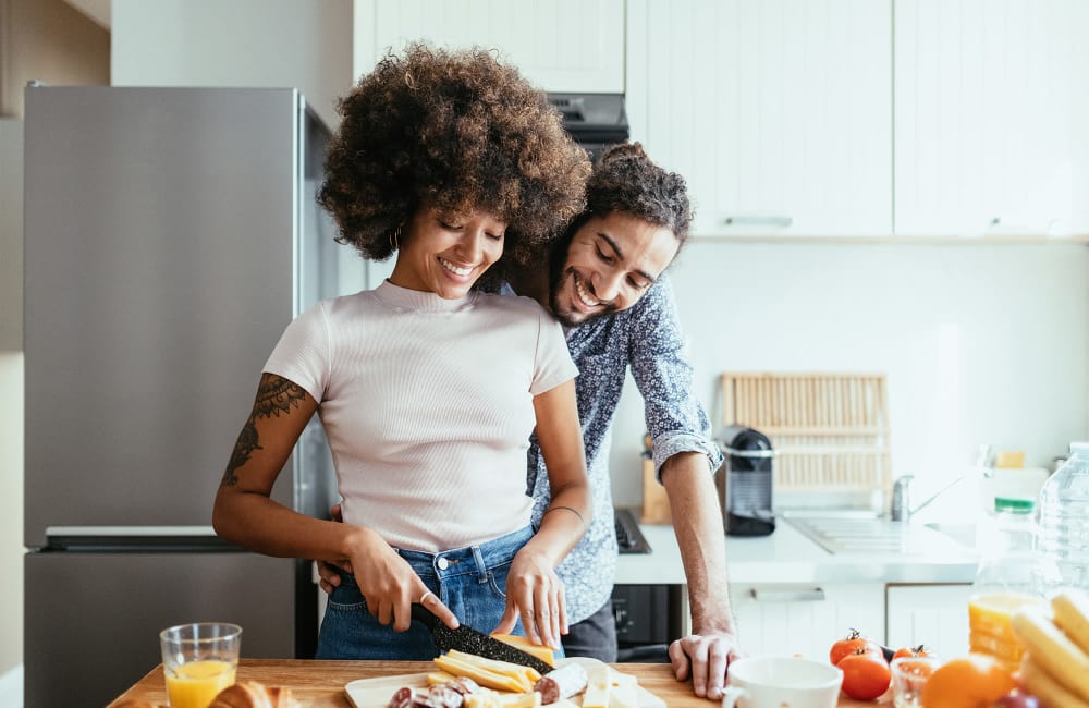 Couple cooking at Montecito Terraces in Panorama City, California