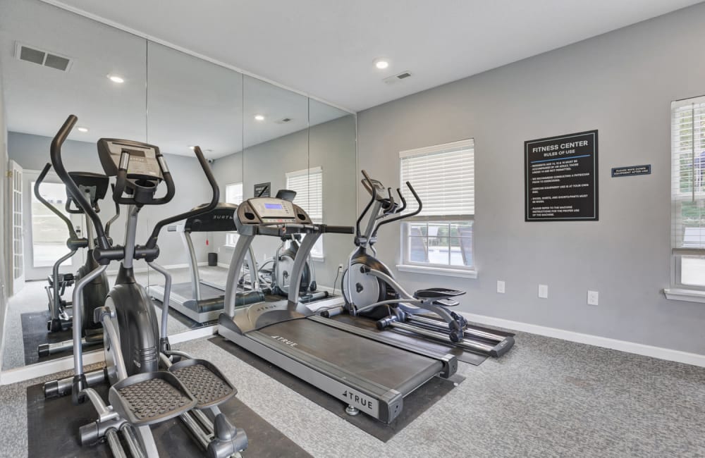 Cardio equipment in the fitness center at Clemmons Station Apartment Homes in Clemmons, North Carolina