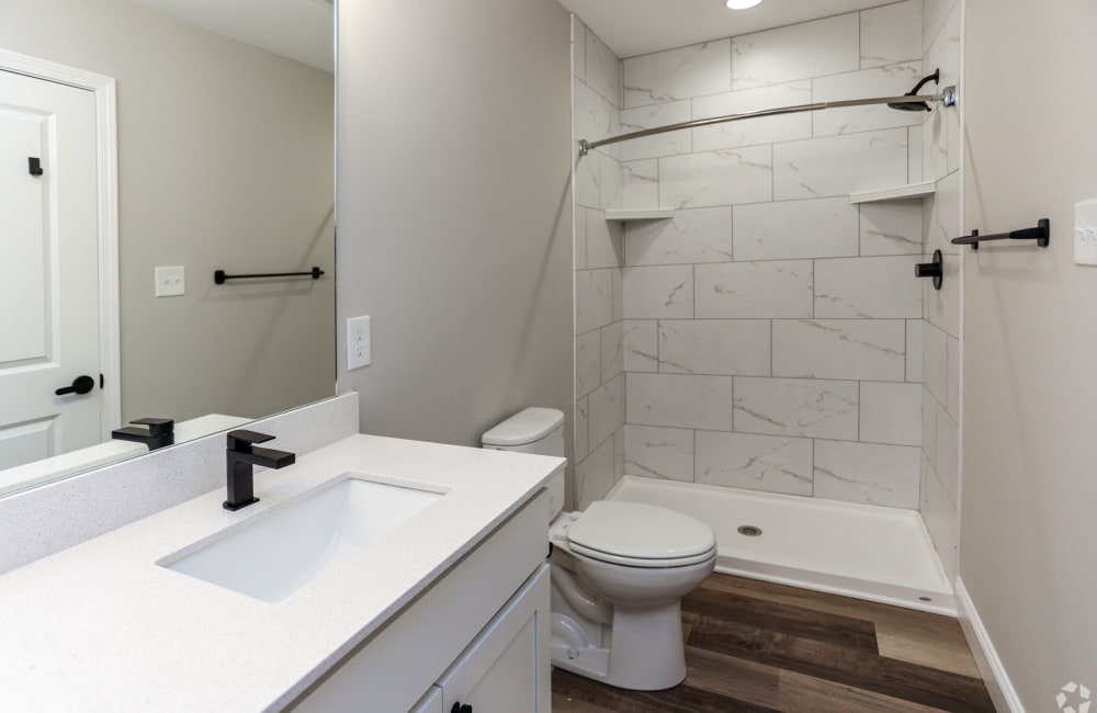 Wood style flooring in the bathroom at Pleasant Ridge Stables in Knoxville, Tennessee