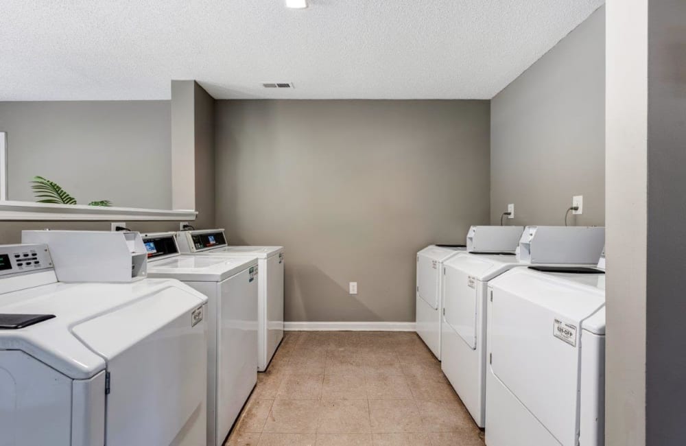 Washer and dryer combo area in apartments with utilities included located at Kannan Station Apartment Homes in Kannapolis, North Carolina