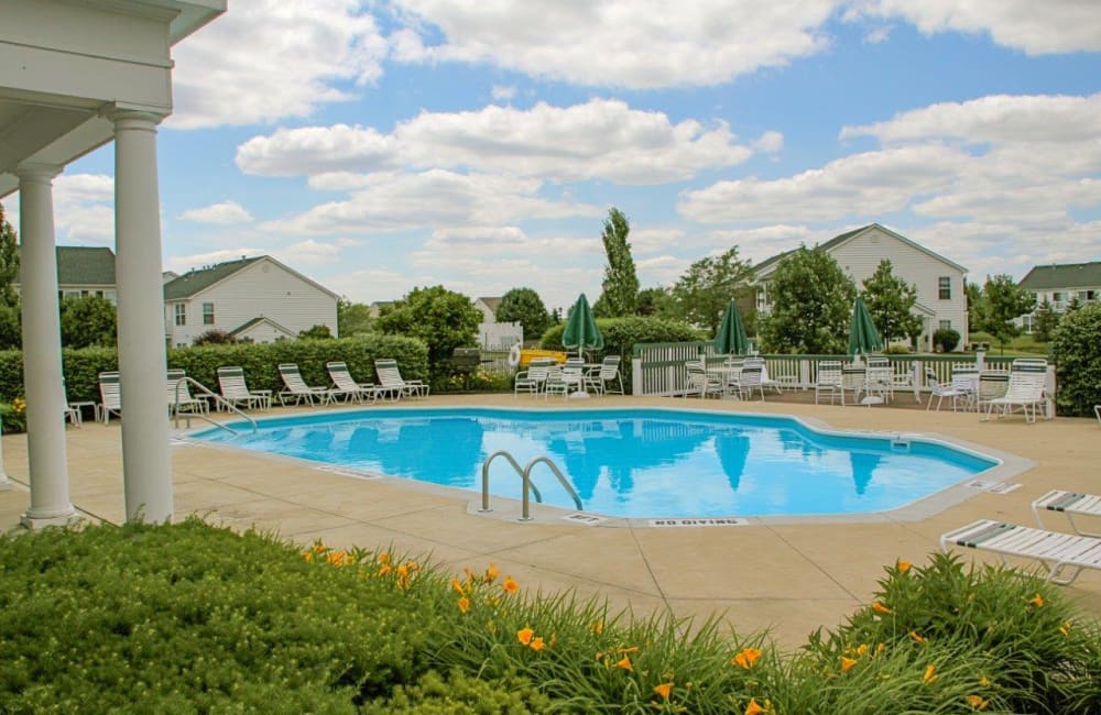 Sparkling blue swimming pool at Eastpointe Lakes Apartment and Townhomes in Blacklick, Ohio