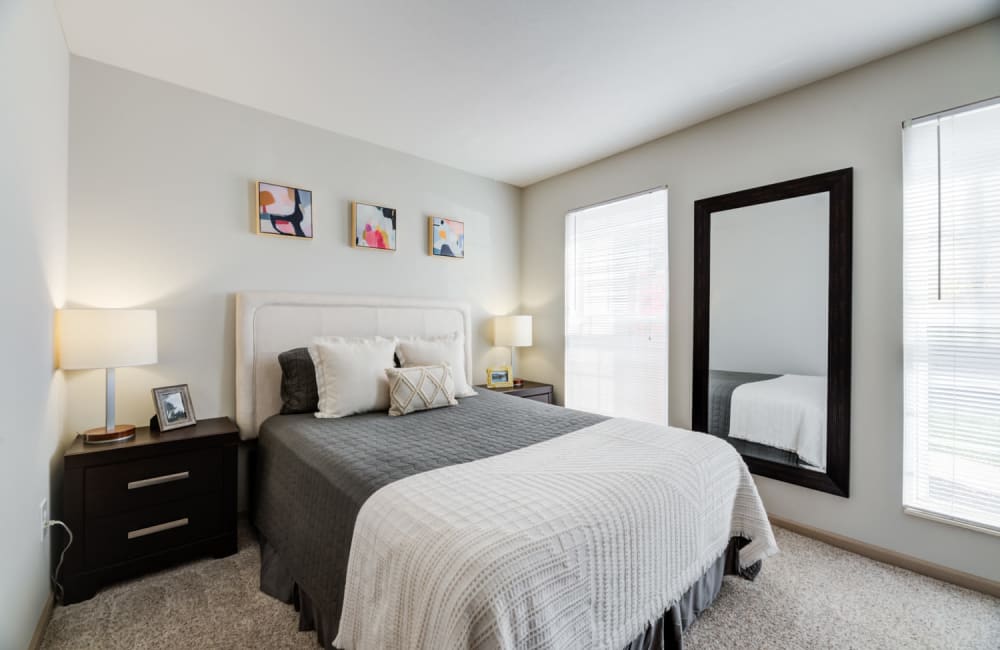 Spacious staged bedroom at Eastpointe Lakes Apartment and Townhomes in Blacklick, Ohio