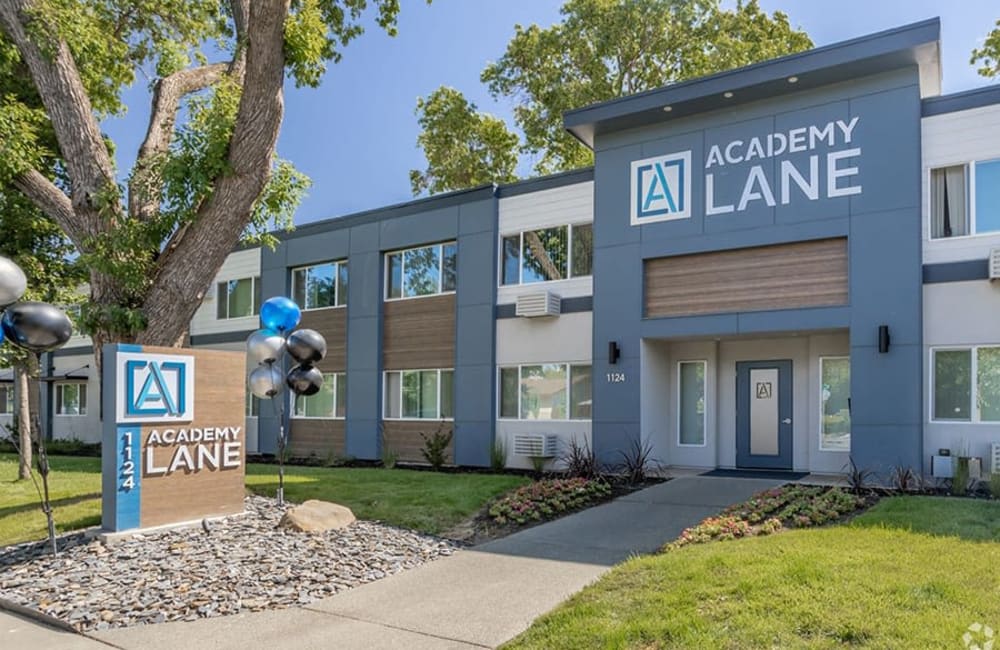 Exterior building with private balconies at Academy Lane Apartment Homes in Davis, California