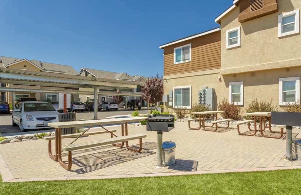 Outdoor tables and a grilling station at Sky Vista Commons North & South in Reno, Nevada