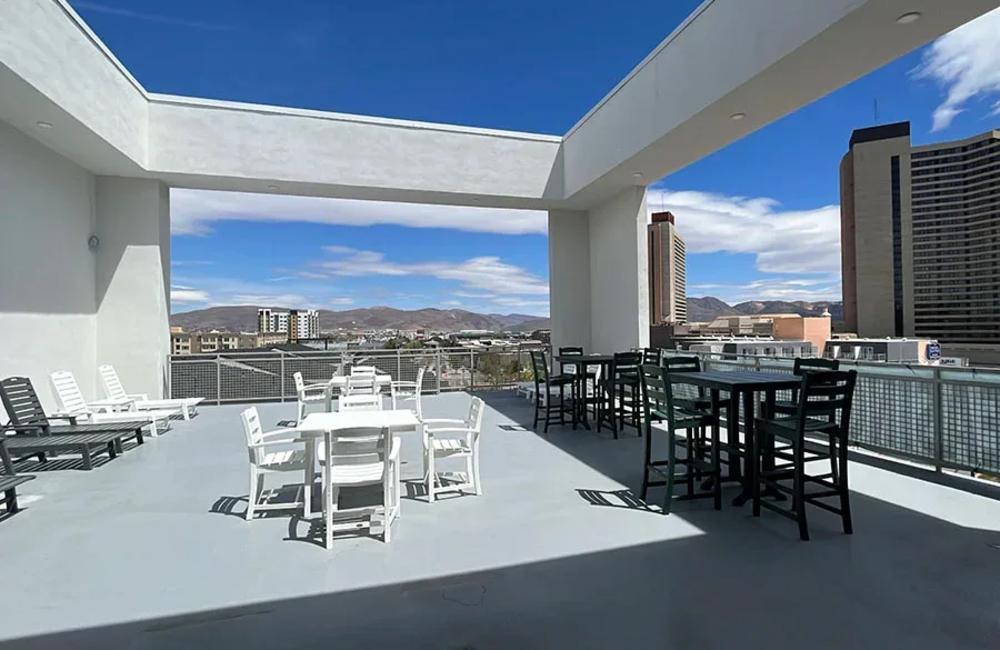 Rooftop area with tables and beautiful view at The Atrium at Victorian Square in Sparks, Nevada