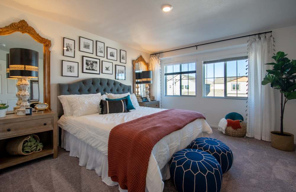 Plush carpeting in a furnished, spacious bedroom in a home at Aspen Vista at Anchor Pointe in Reno, Nevada
