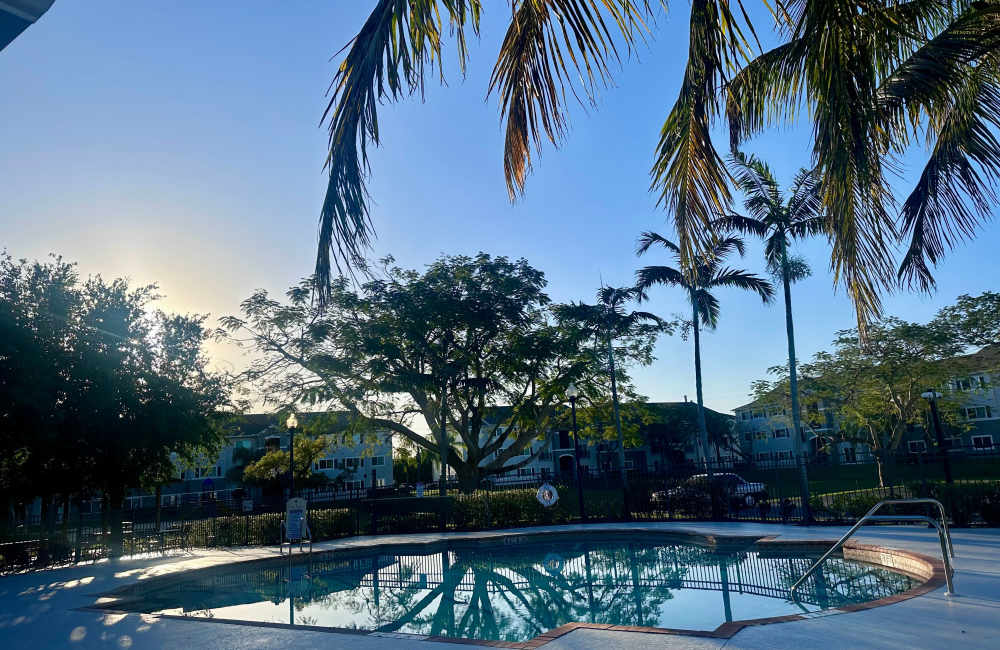 The community swimming pool at dusk at Hawk's Landing in Fort Myers, Florida
