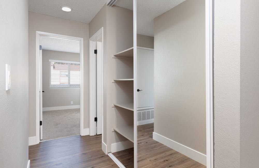 Hallway with linen closet at Creekside Terrace in Castro Valley, California