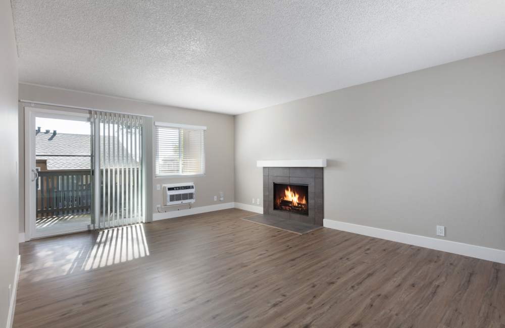 Living room with fireplace at Creekside Terrace in Castro Valley, California