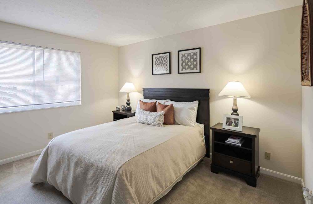 Bedroom with a large window at Reserve at Ft. Mitchell Apartments in Ft. Mitchell, Kentucky