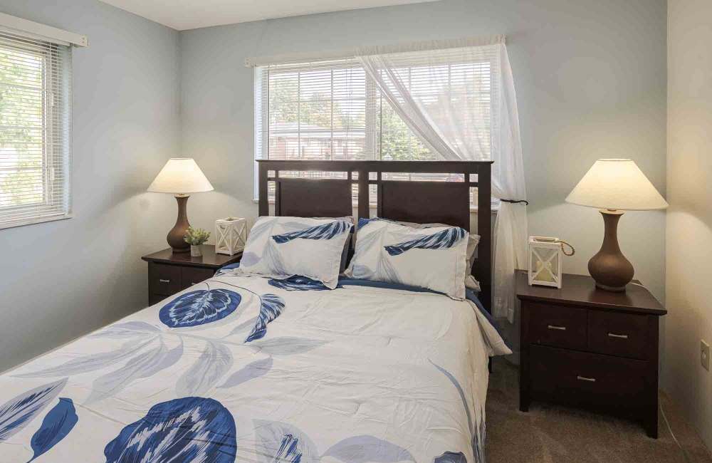 Bedroom in an apartment at Four Seasons Apartments in Erlanger, Kentucky