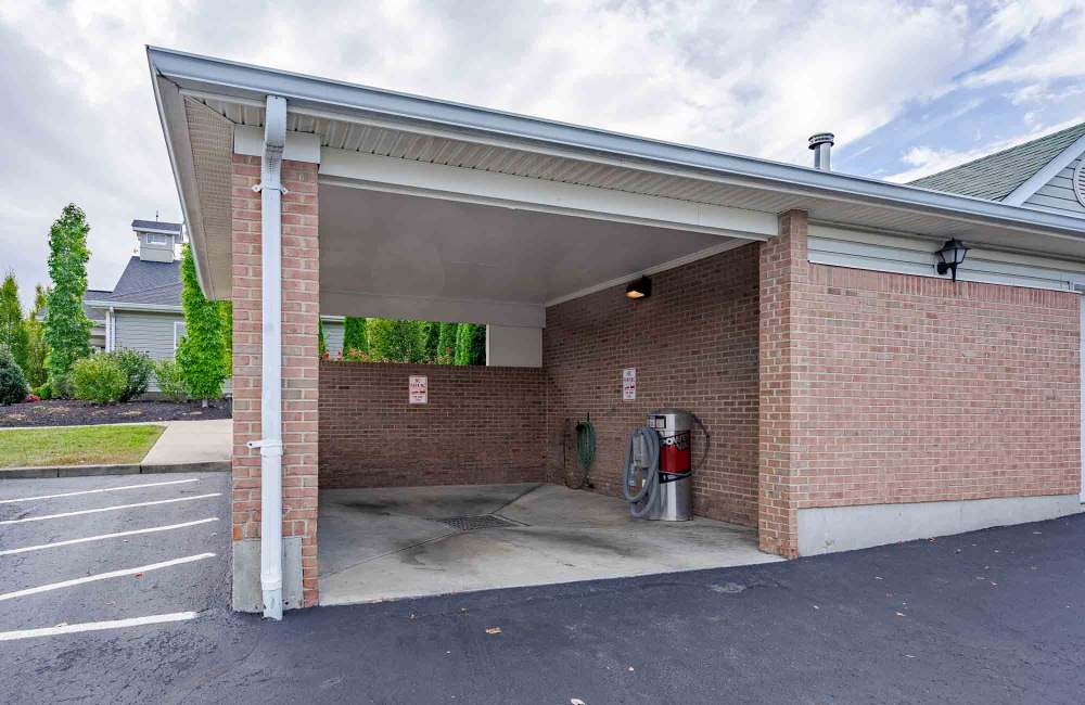 Car washing area at Aspen Pines Apartment Homes in Wilder, Kentucky