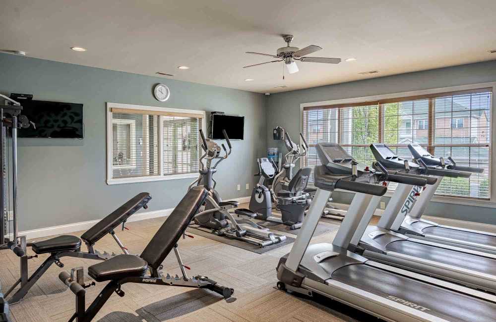 Fitness center at Aspen Pines Apartment Homes in Wilder, Kentucky