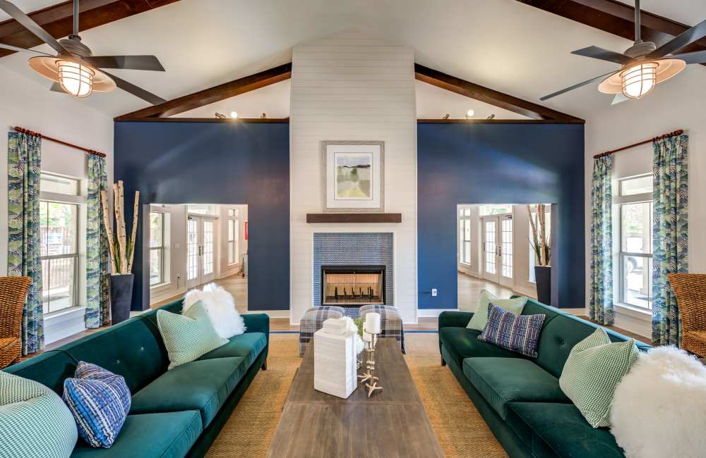 Modern design clubhouse with lounge chairs at The Forum at Grand Prairie in Grand Prairie, Texas, 
