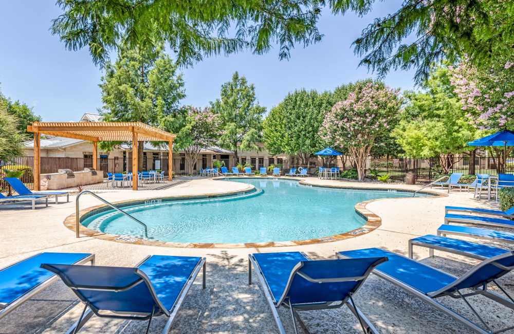 Pool area with lounge seating at The Forum at Grand Prairie in Grand Prairie, Texas, 