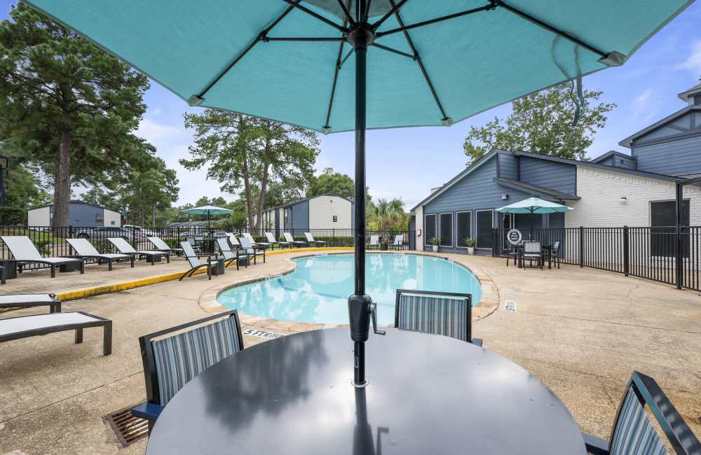 Swimming pool with canopy at Northside Heights in Conroe, Texas