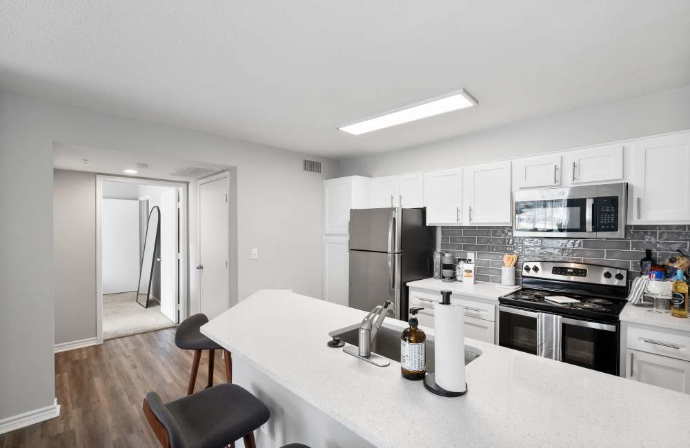 Spacious island kitchen at Park At Woodmoor Apartments in Shenandoah, Texas, 