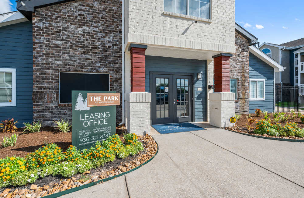 Lots of plants outside of leasing office at Park At Woodmoor Apartments in Shenandoah, Texas, 