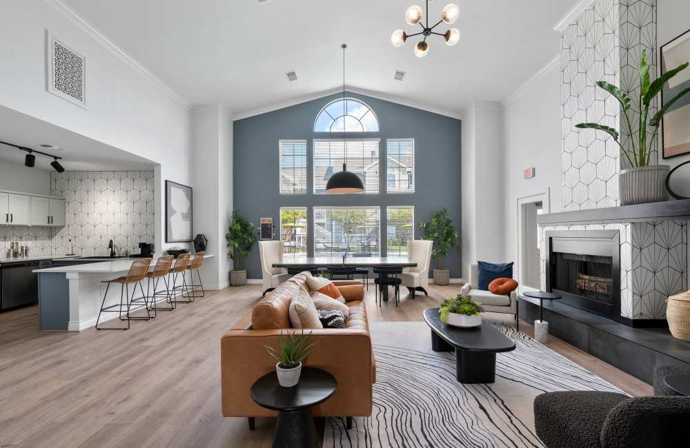 Spacious clubhouse with lots of space for couch,coffee table and more at Park At Woodmoor Apartments in Shenandoah, Texas, 