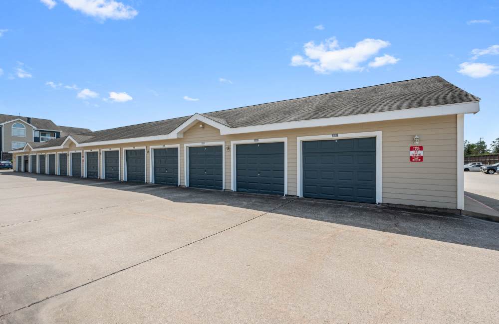Garage parking at Park At Woodmoor Apartments in Shenandoah, Texas, 