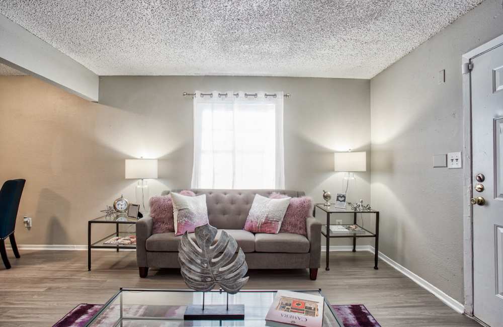 Couch in the living room at Woodside Flats in Dallas, Texas, 
