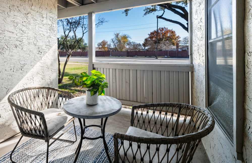 Private balcony with two chairs at 18Eleven Frankford in Carrollton,Texas