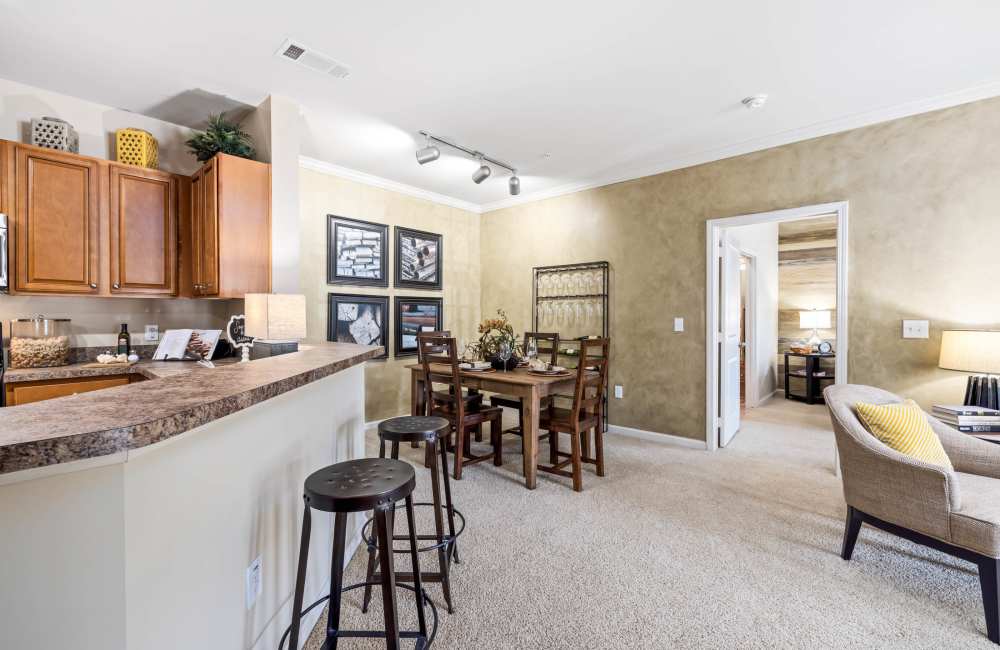 Beautiful open-kitchen with a breakfast counter at Wembly At Overlook in Macon,Georgia