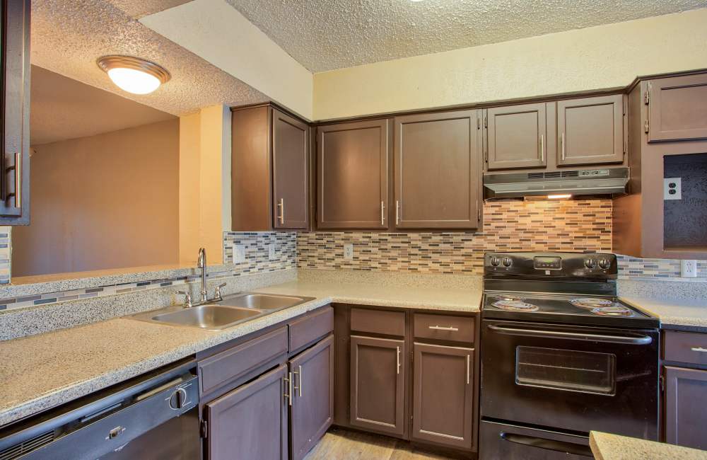 Kitchen with latest appliances at Highlands Creek Apartments in Dallas,Texas