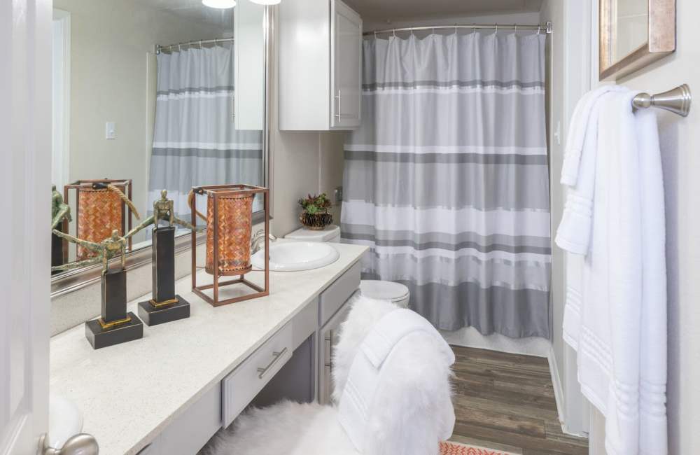 Modern apartment bathroom at Copper Chase in Arlington, Texas