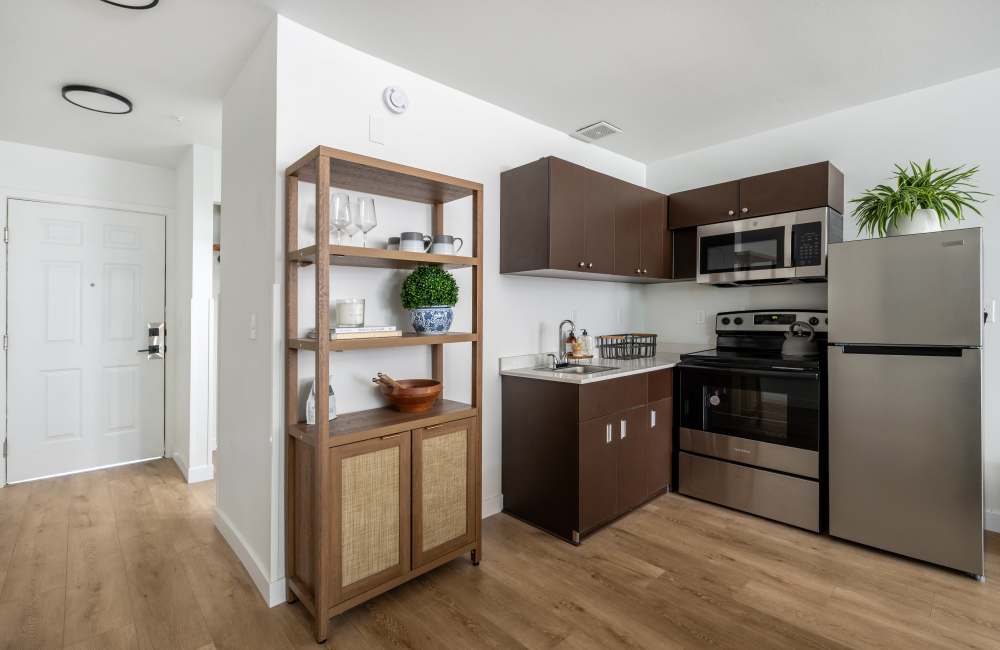 Furnished Studio Apartment Kitchen in Model at The Varsity in Centralia, Washington