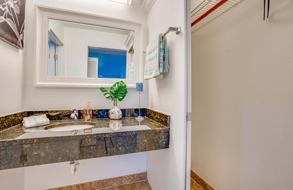 Well-lit bathroom at MainGate Village in Kissimmee, Florida