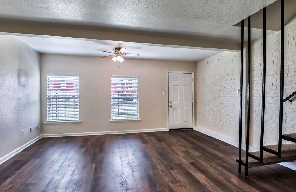 Living room  with ceiling fan at Skyview Terrace Apartments in New Orleans, Louisiana