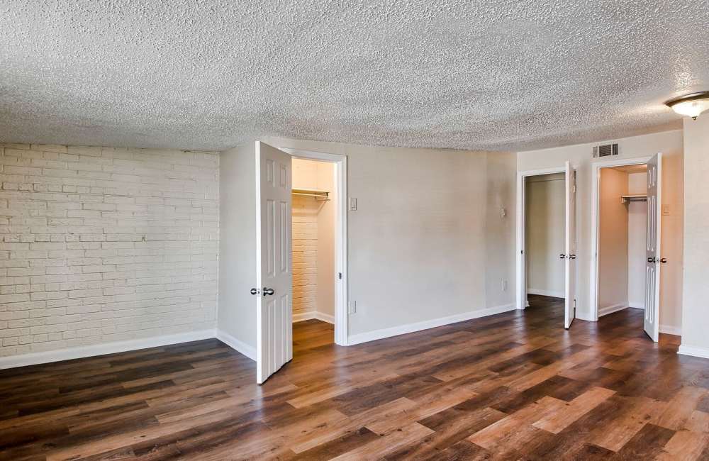 Hardwood-style flooring in the living room at Skyview Terrace Apartments in New Orleans, Louisiana