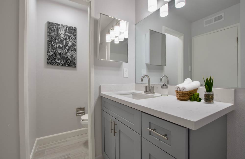 Modern bathroom with double sink vanity at The Eleven Hundred in Sacramento, California