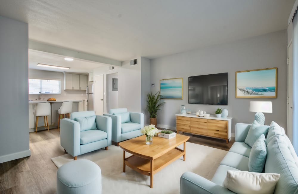 tylish living space with wooden coffee table at The Eleven Hundred in Sacramento, California