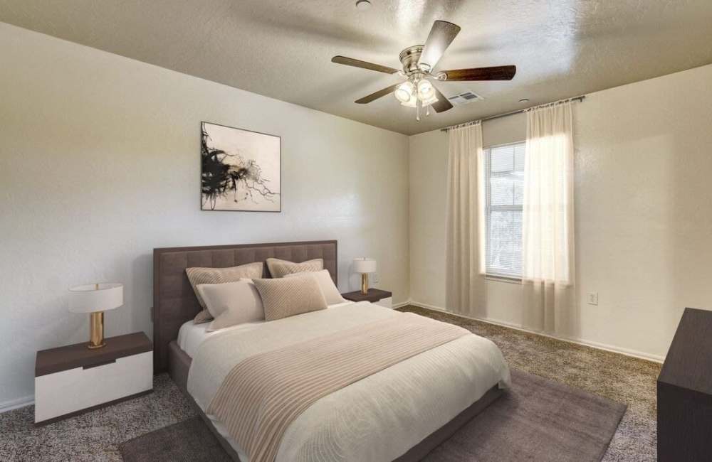 Bedroom with window at Oak Place Apartments in Oklahoma City, Oklahoma
