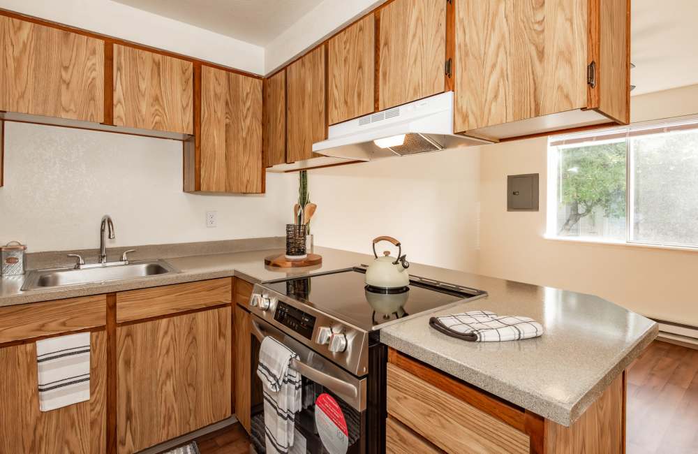 Staged kitchen in Heron Hills Apartment Homes in Gresham, Oregon