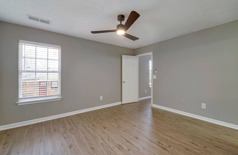 Well-lit living room at The Avenue in Cartersville, Georgia
