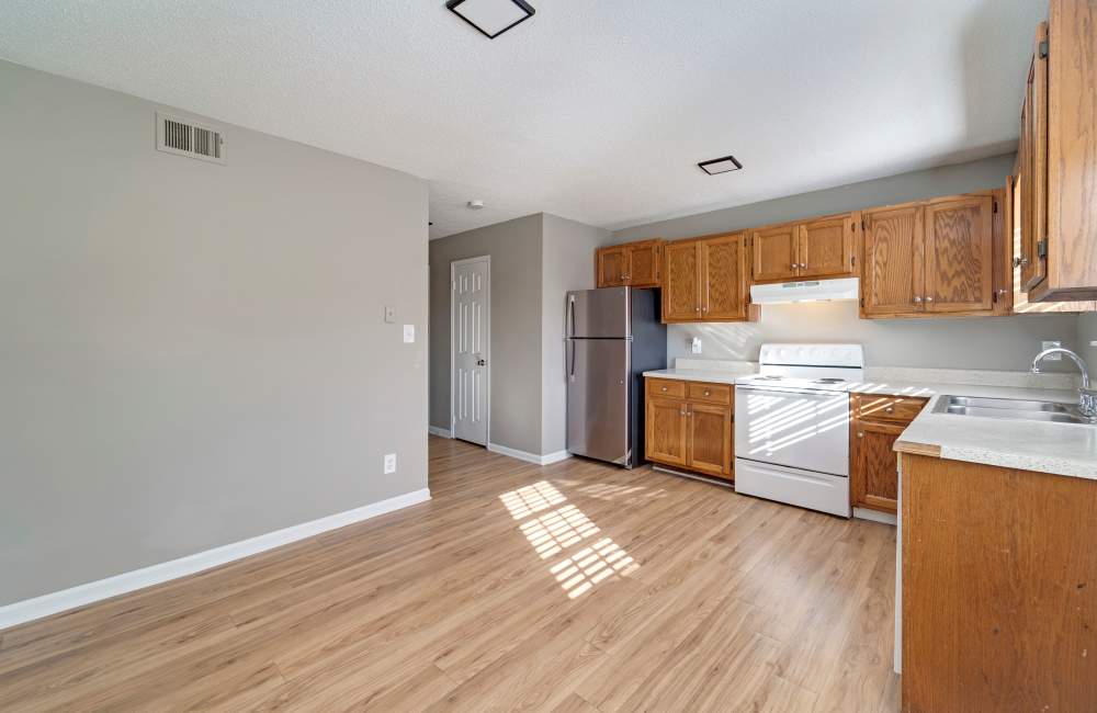 Upgraded kitchen with modern appliances and ample natural light at Collins Pointe in Cartersville, Georgia