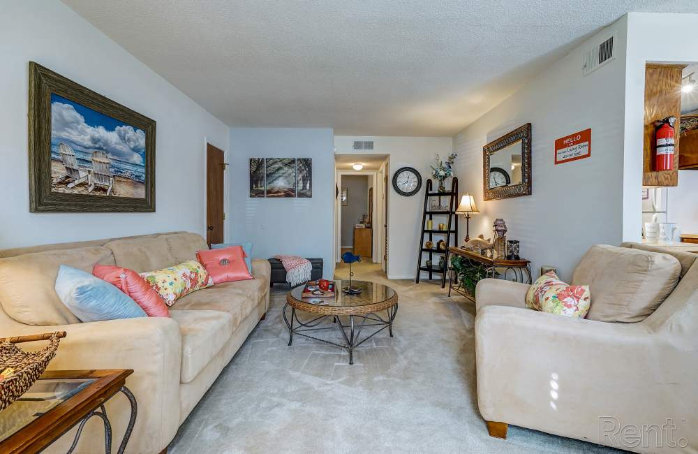 Living room with couch and carpet flooring at Pine Lakes in , South Carolina
