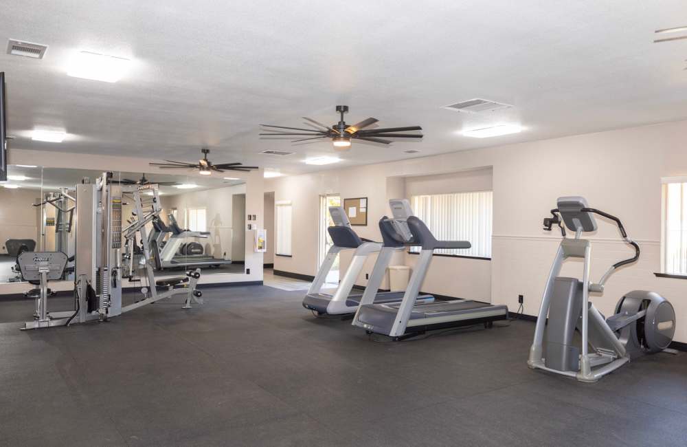 Fitness center with strength training equipment at Terrace View Apartments in Fresno,California