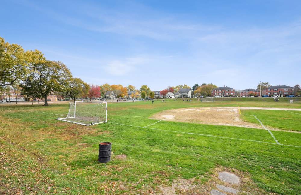 Community playground with goal post at Arlington Gardens in Arlington, Massachusetts